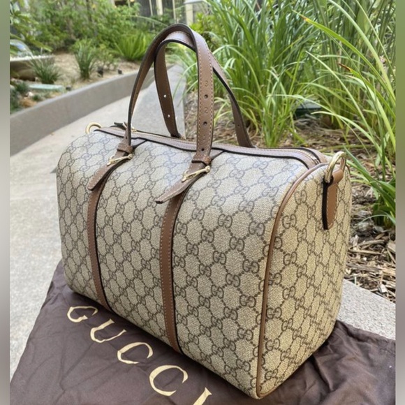 Gucci Handbags - Gucci Tan and Brown Monogram Duffel Bag